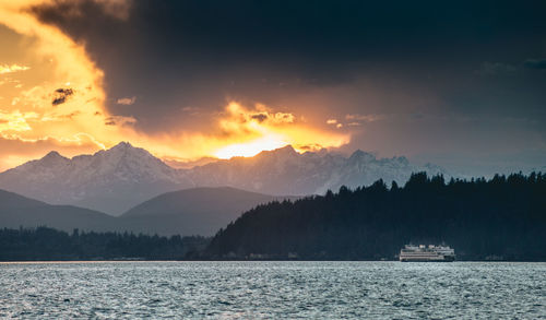 Scenic view of mountains against sky during sunset