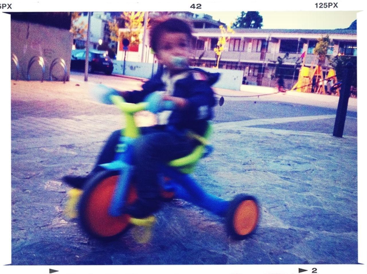 transfer print, auto post production filter, childhood, leisure activity, playing, lifestyles, full length, street, toy, fun, enjoyment, outdoors, incidental people, men, playful, sport, arts culture and entertainment, art and craft, day