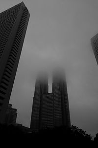 Low angle view of modern buildings against sky