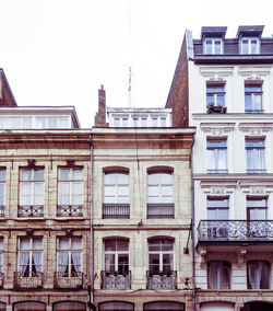 Low angle view of residential building against sky