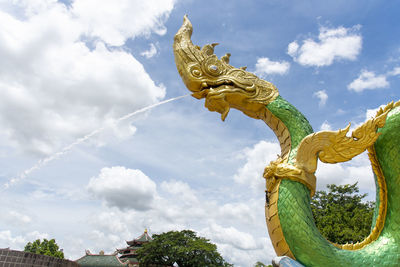 Low angle view of statue against sky