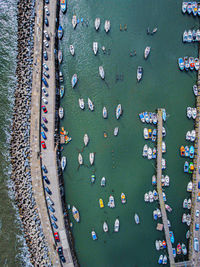 High angle view of multi colored umbrella on land