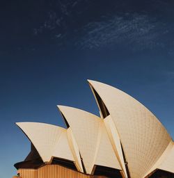 Low angle view of building against blue sky