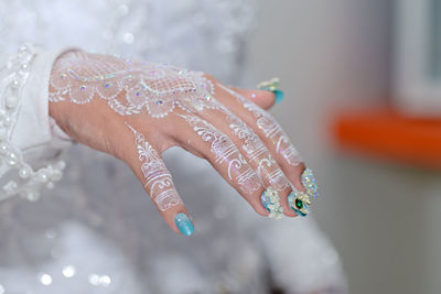 Close-up of woman hand with nail art