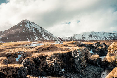 Scenic view of snowcapped mountains against sky