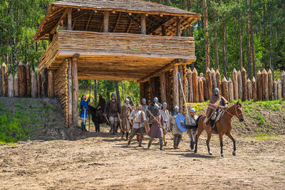 Group of people riding horses