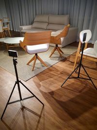 High angle view of chairs on table at home