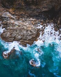 High angle view of rock formation at sea shore