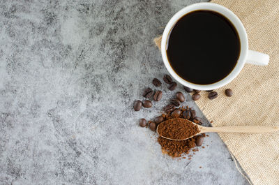 High angle view of coffee cup on table