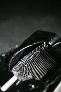 High angle view of piano keys against black background