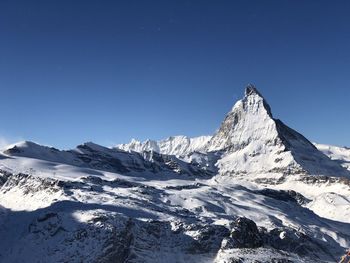 The matterhorn on a clear sunny day on christmas day in zermatt, switzerland.