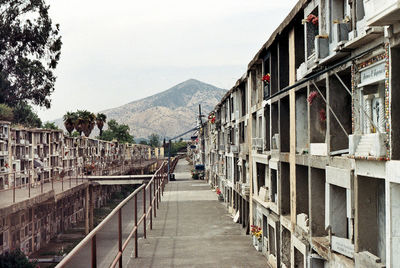 Footpath along cemetery leading towards mountain