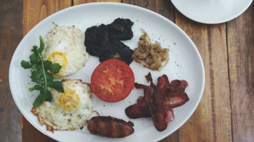 Close-up of breakfast served on table