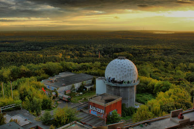 High angle view of townscape against cloudy sky