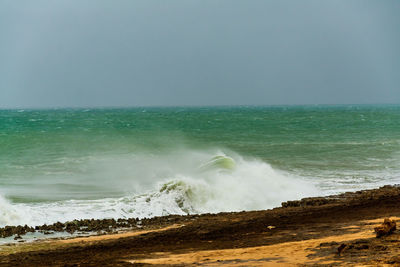 Scenic view of sea against clear sky