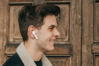 Portrait of young man looking away