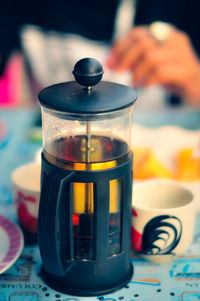 Close-up of tea cup on table.