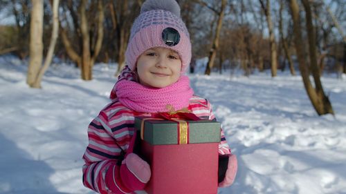 Portrait of boy wearing hat during winter