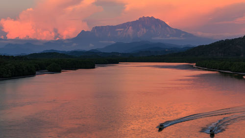 View of scenic view of mountains during sunset