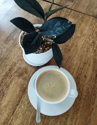 High angle view of coffee cup on table