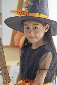 Portrait of cute girl in halloween