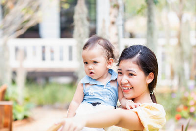 Portrait of a cute baby girl outdoors