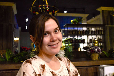 Portrait of young woman at home