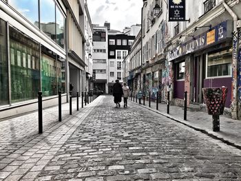 People walking on city street