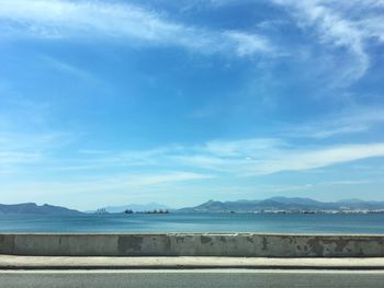 Scenic view of sea against blue sky