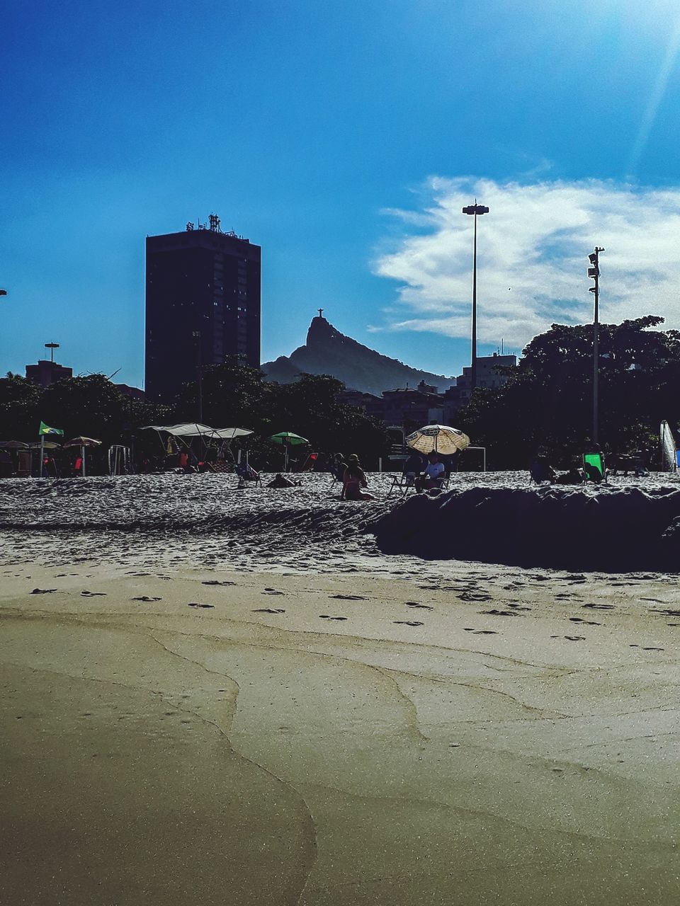 sky, sea, architecture, coast, beach, built structure, building exterior, land, nature, horizon, city, ocean, dusk, water, cloud, building, shore, outdoors, no people, evening, travel destinations, sand, reflection, wave, day, landscape