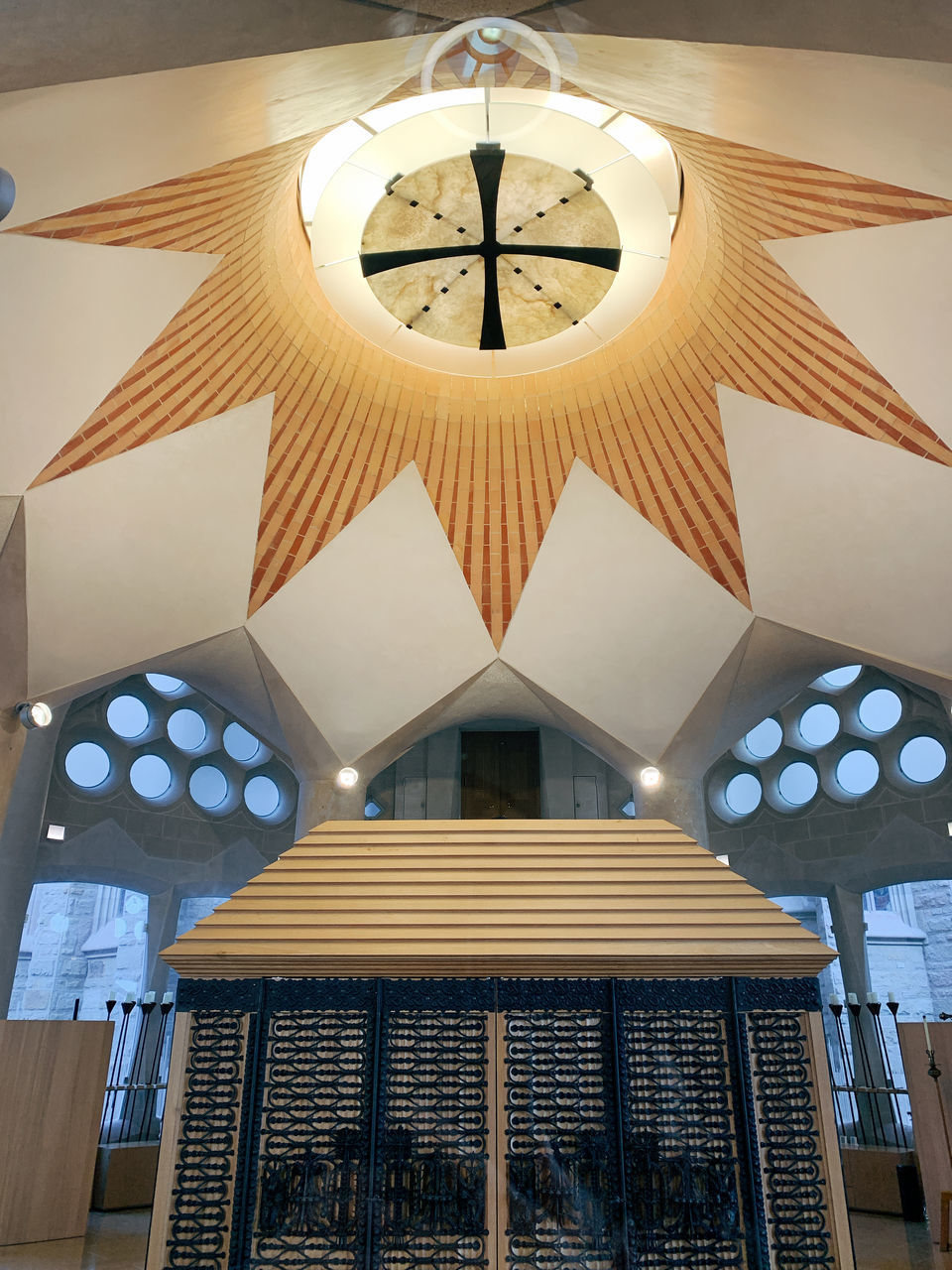 LOW ANGLE VIEW OF ILLUMINATED PENDANT LIGHT HANGING FROM CEILING