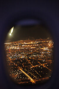 High angle view of illuminated cityscape