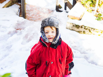 Portrait of cute boy in snow