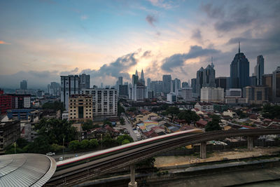 High angle view of buildings against sky during sunset