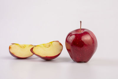 Close-up of apples against white background