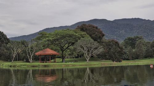 Scenic view of lake with mountains in background