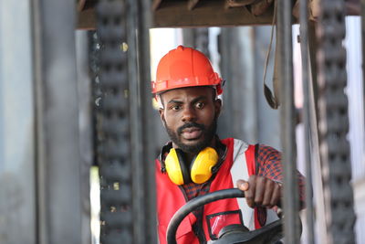 Portrait of man working in factory