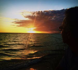 Scenic view of sea at sunset