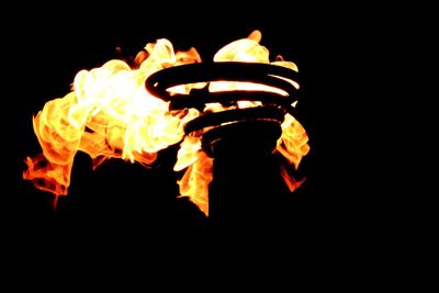 Close-up of illuminated bonfire at night