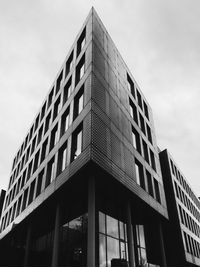 Low angle view of modern building against sky