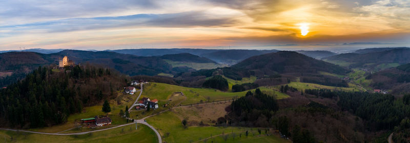 Scenic view of mountains against sky during sunset