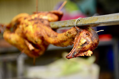 Close-up of meat on barbecue grill