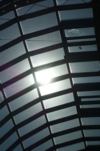 Low angle view of window against sky