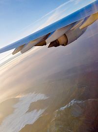 Aerial view of sand dunes in desert against sky