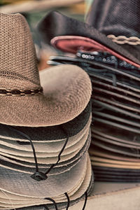 Close-up of hats stack for sale