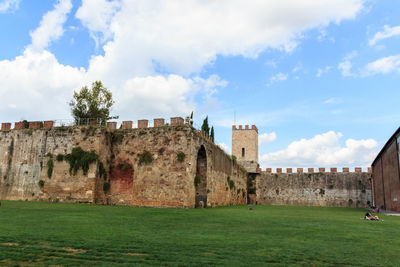 Old ruin building against cloudy sky