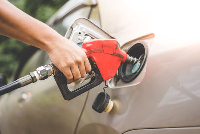 Close-up of hand holding car