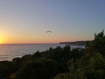 Scenic view of sea at sunset