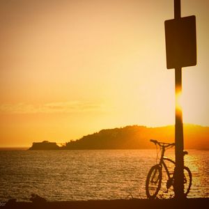 Scenic view of sea at sunset