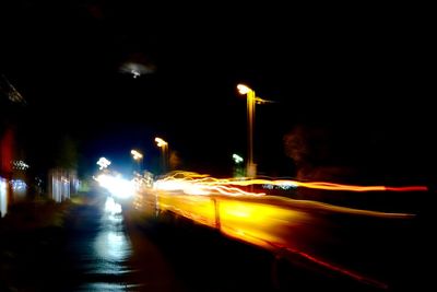 Illuminated street light at night